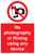 No photography or filming using any device sign